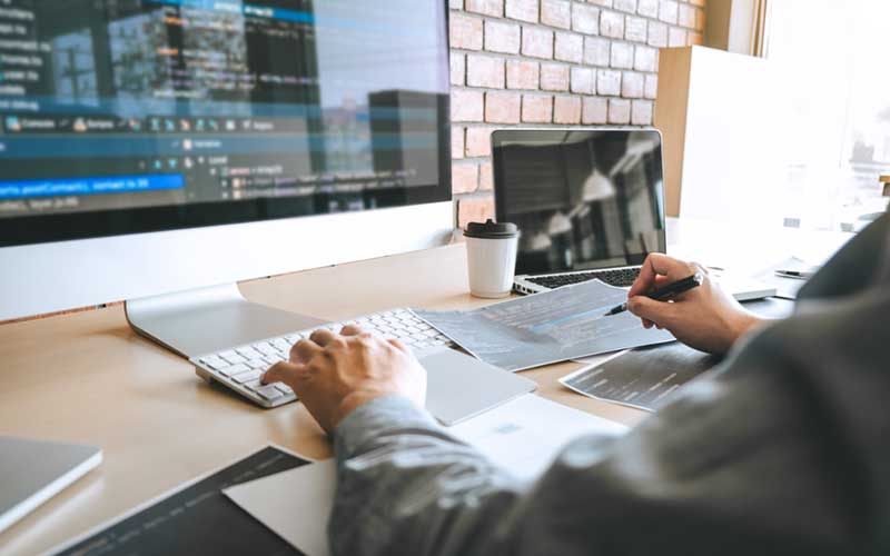 Photo - Person Coding