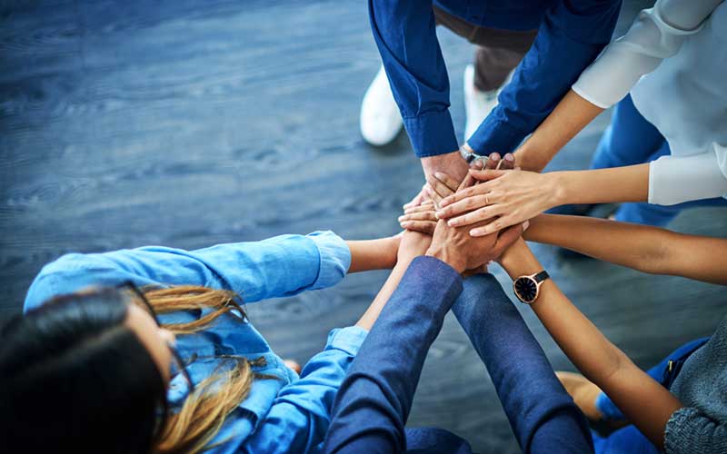 Photo - People holding Hands